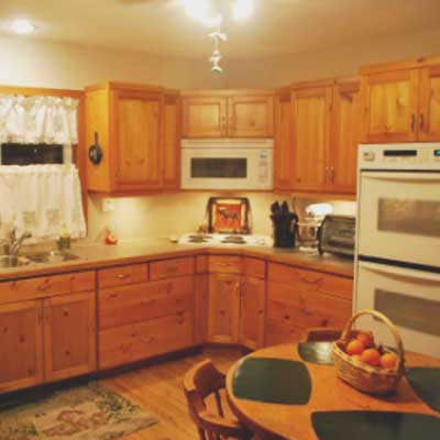 Reno a kitchen with custom built pine cupboards